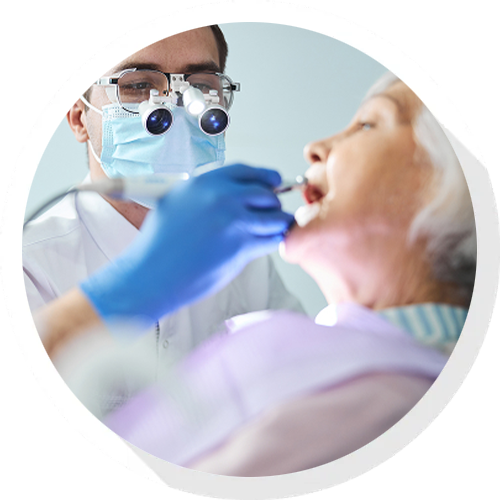 Man at the dentist, smiling.